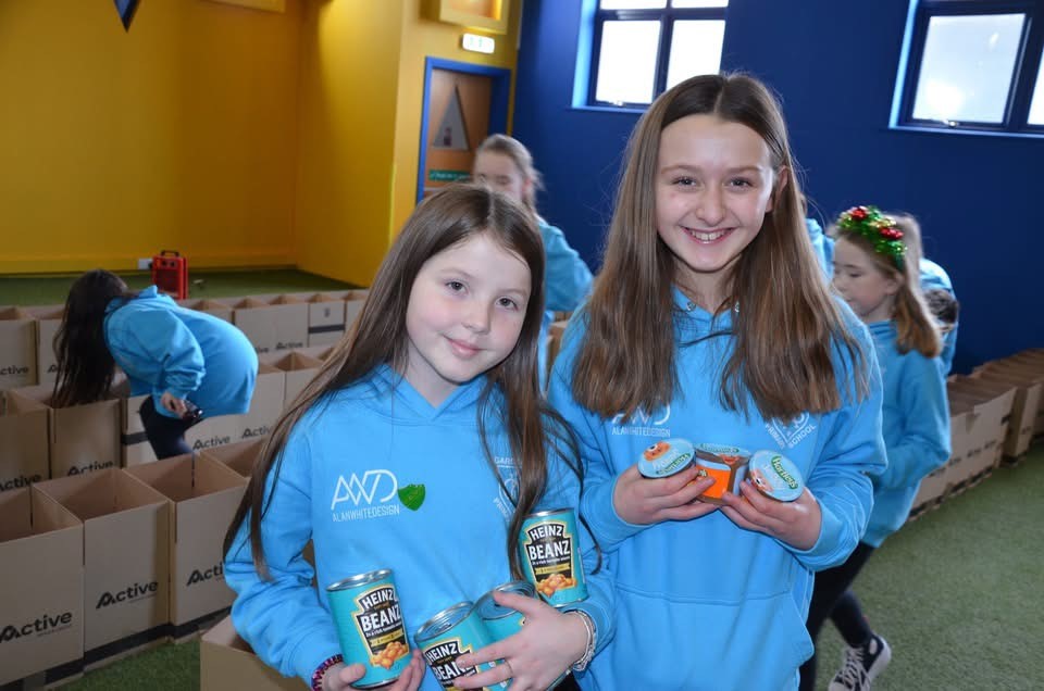 Two members of Gargieston Primary School girls' football club