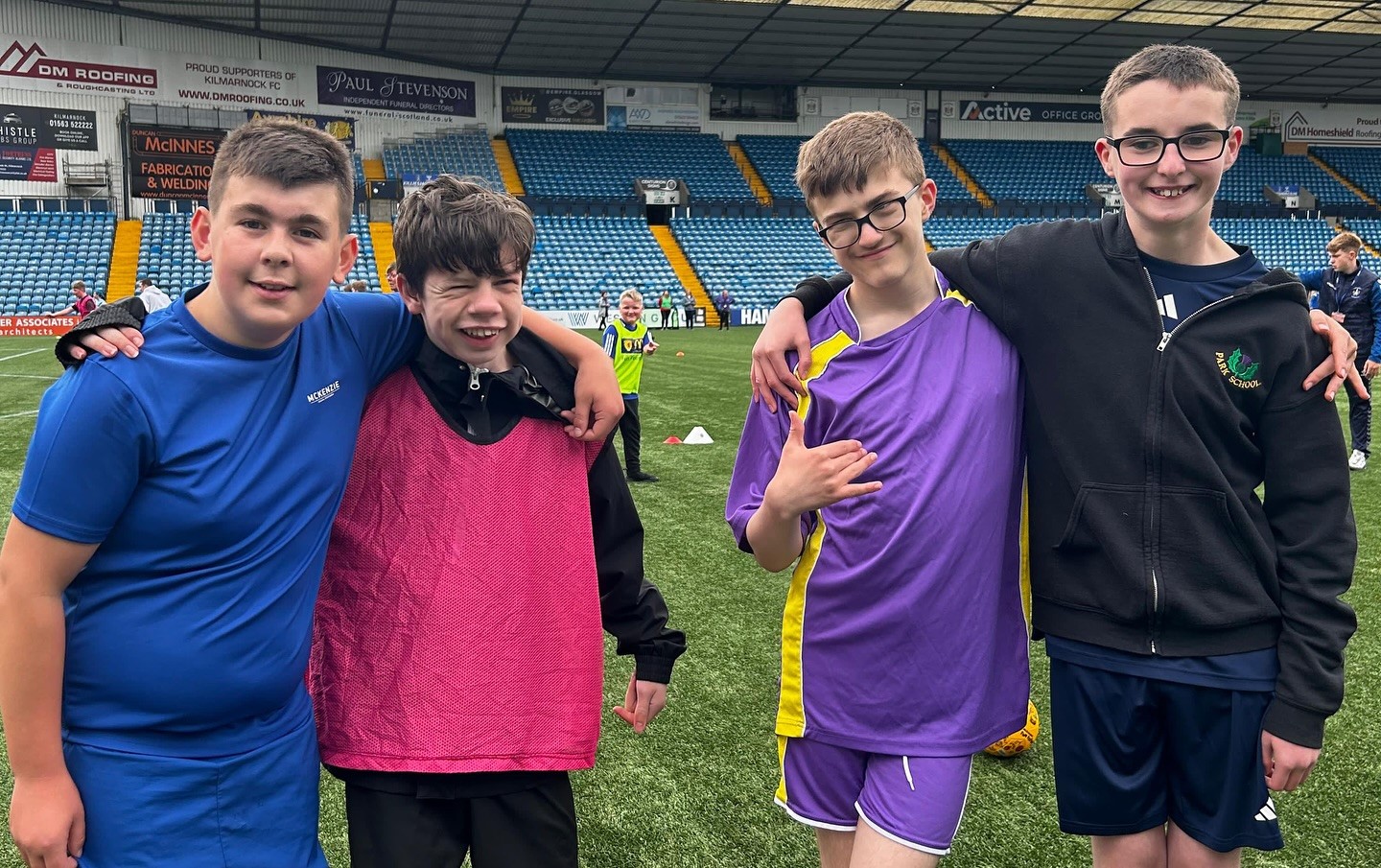 A group of young boys attending the event at Rugby Park
