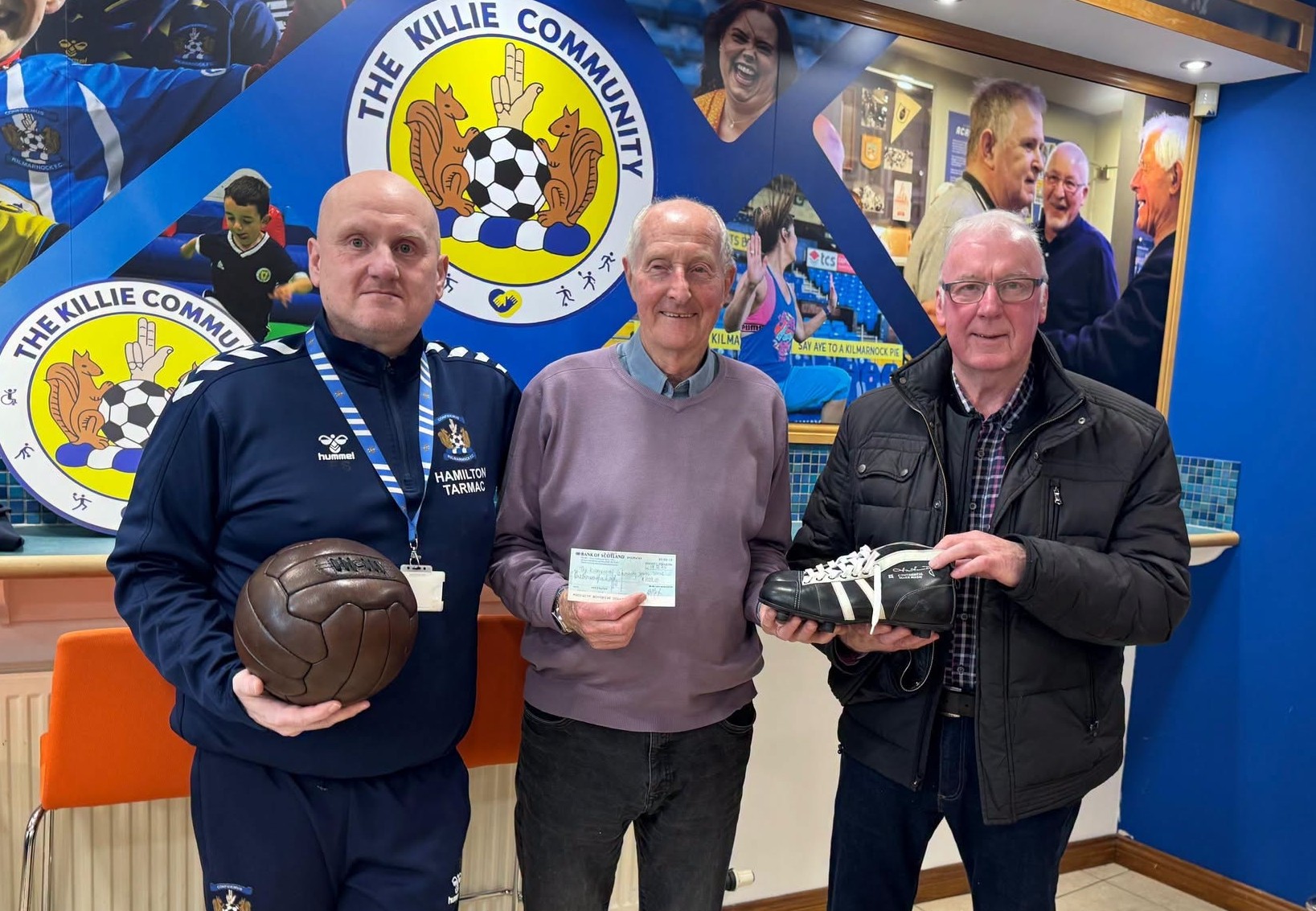 Attendees and facilitators at a recent Football Memories group meeting